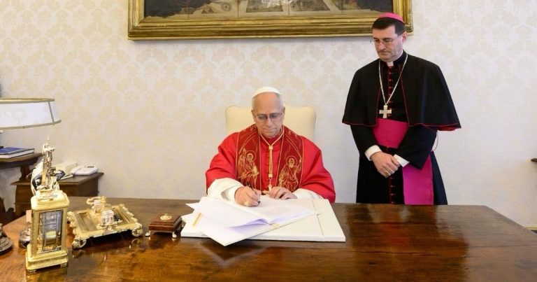 Pope-Leo-XIV-signing-his-first-encyclical-