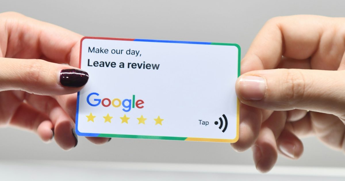 hand-holding-a-card-asking-for-review